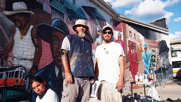 Artists bring fresh paint, new faces to Dudley mural