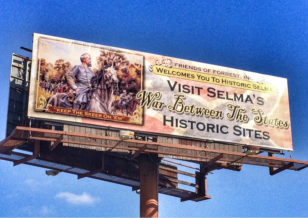 A billboard to honor founder of Ku Klux Klan greeted marchers at Selma “Bloody Sunday” event
