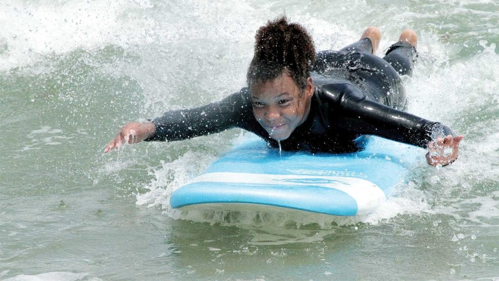 Dorchester teens learn how to surf