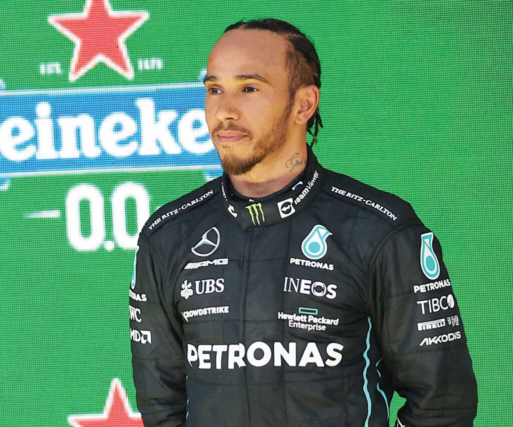 Black Formula One star Lewis Hamilton ties for F1 most wins