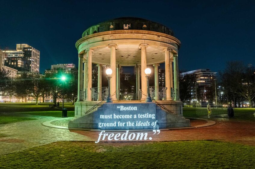 Guerrilla artist group projects anti-tyranny messages around Boston